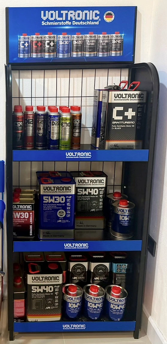 Actual VOLTRONIC engine-oil and treatment display at Garage SOI 5